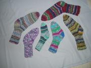 Handstickade sockor olika storlekar